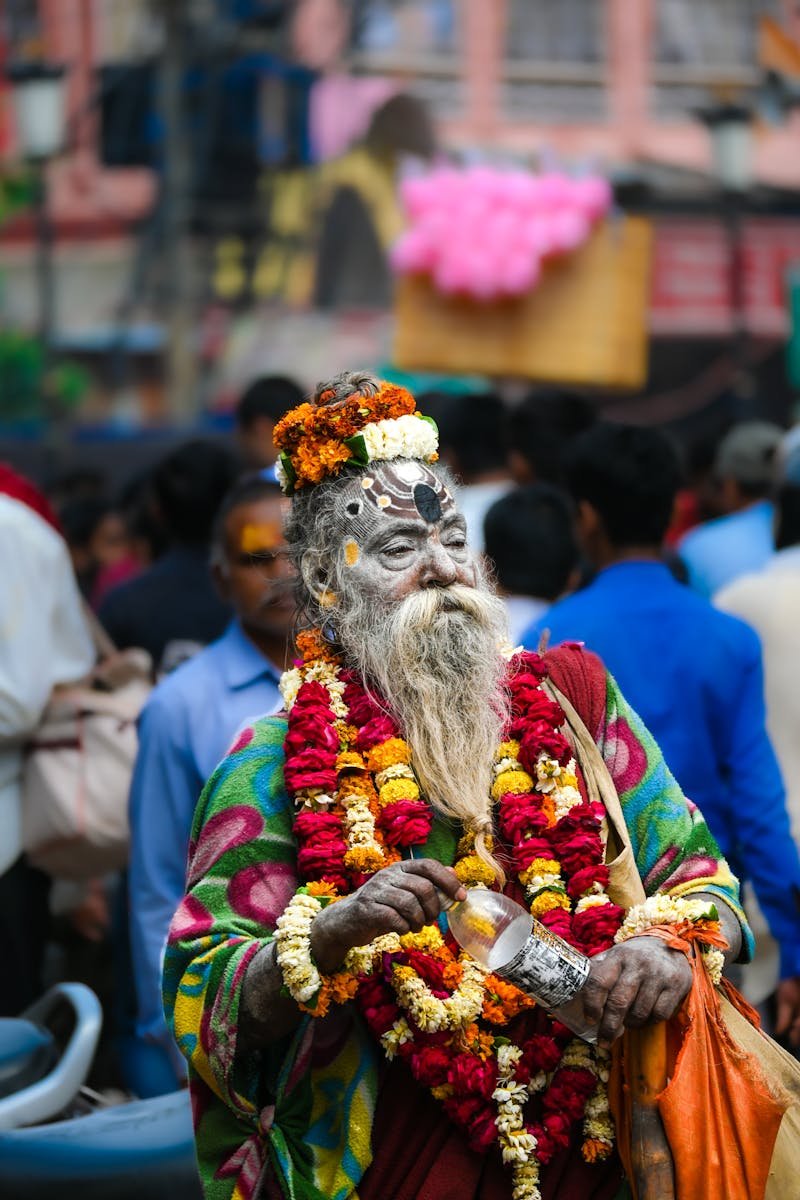 A Man in Traditional Costume at the Market