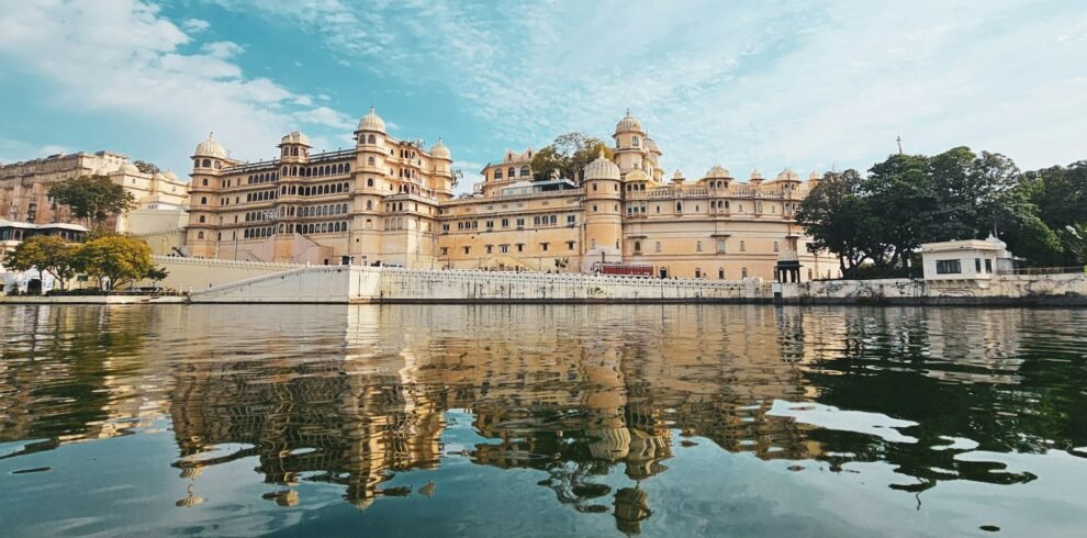 a large building sitting on top of a lake